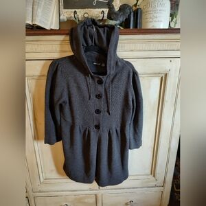 Wet seal extra large cute baby doll sweater and great condition no problems size